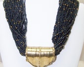 Funky Vintage black seed bead and gold toned plated necklace
