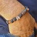 Men's Bracelet with Black Lava, Antique Coper Hearts and Filigree, Orange Recycled Glass