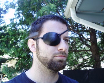 Pirate leather eye patch, you choose your color. Made of thick leather.