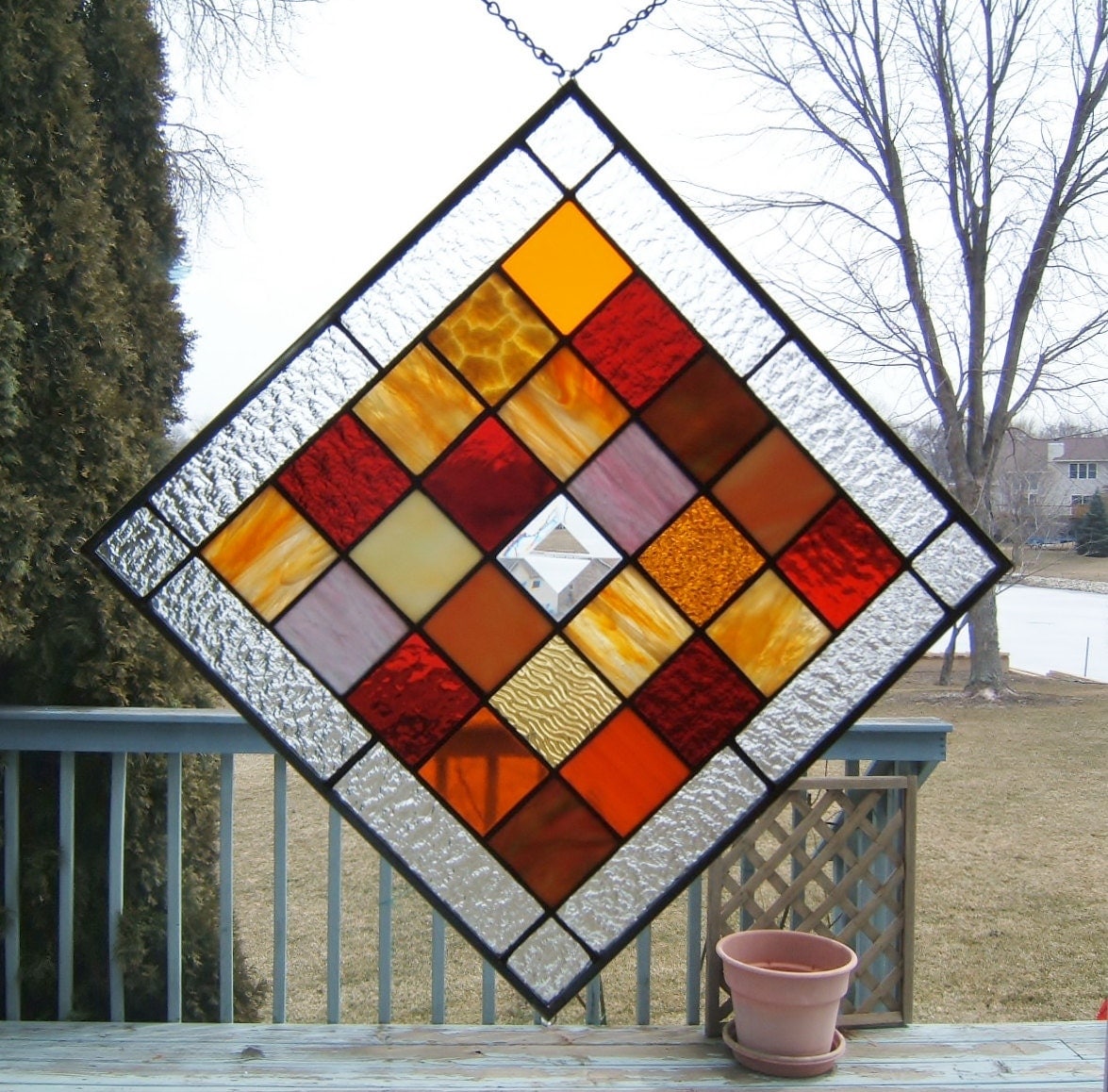 Orange red amber squared stained glass panel window geometric