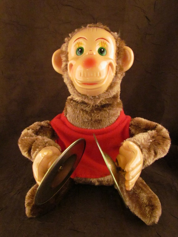 stuffed monkey with cymbals