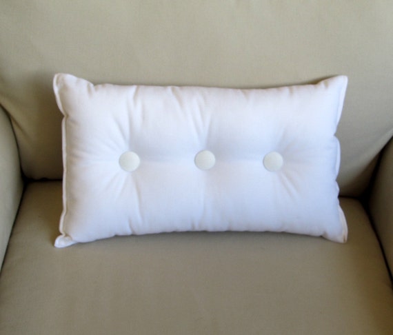 white lumbar pillow