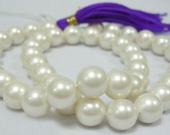 211- Perles de verre polies, 10mm (1 corde)