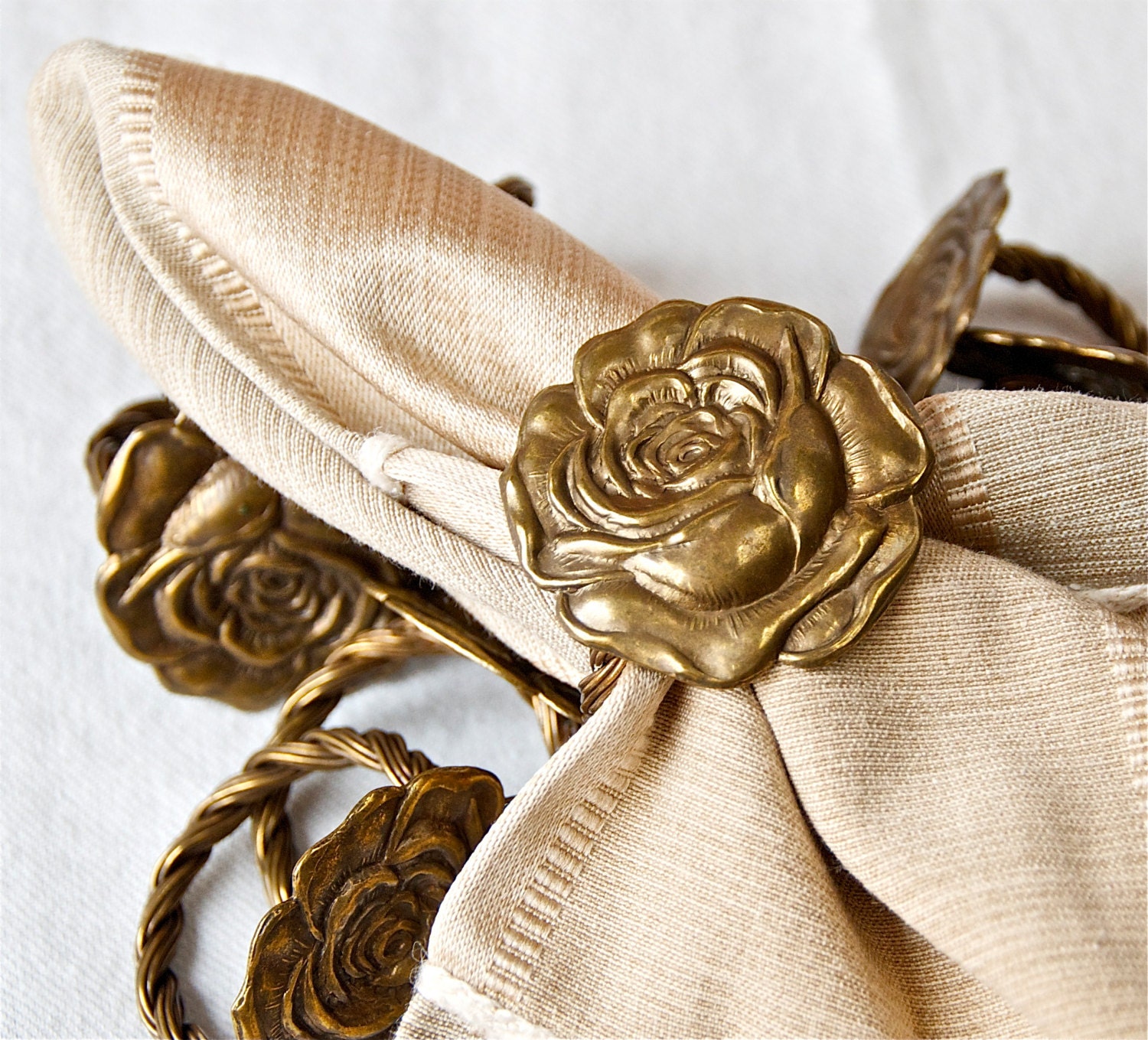 Eight vintage rose napkin rings...brass. by 180degreesvintage