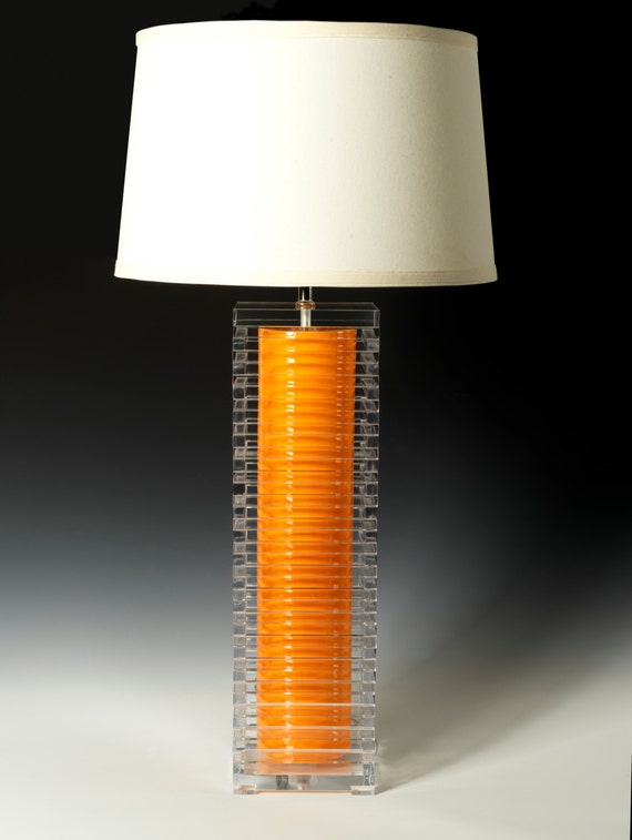 orange table lamp. Modern lighting acrylic lamp bedside