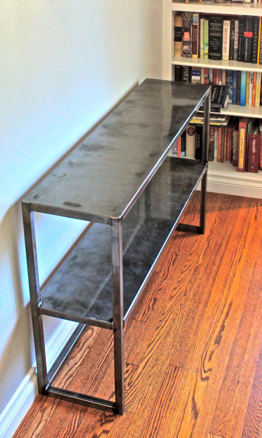 Natural steel table with clear coat finish by CraftMetalWorks