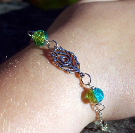 Items similar to Peacock Feather Silver Bracelet with BlueGreen