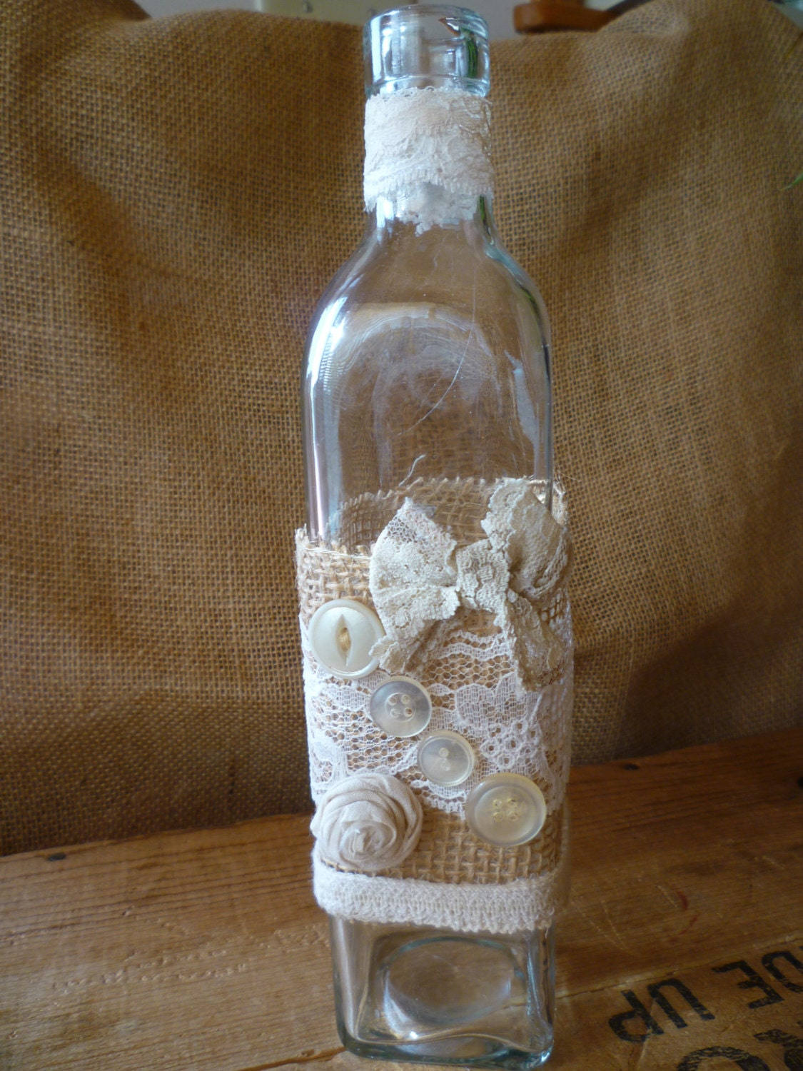 Vintage Bottle Decorated with burlap lace buttons fabric