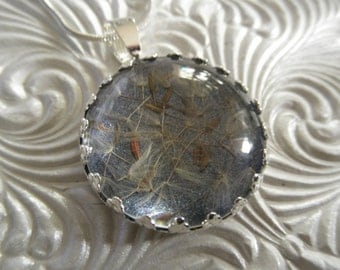 Dandelion Seeds Stardust-Ride The Wind-Victorian Crown Pendant Atop Glistening Dusty Blue Background-Symbolizes Happiness-Gifts Under 25