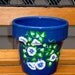 Blue Flower Pot Planter with Blue and White Flowers