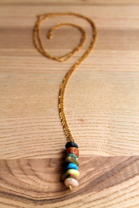 Gold filled thin chain necklace decorated with assorted semi