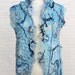 Sky, an Eleganza Scarf in blue made from thrums