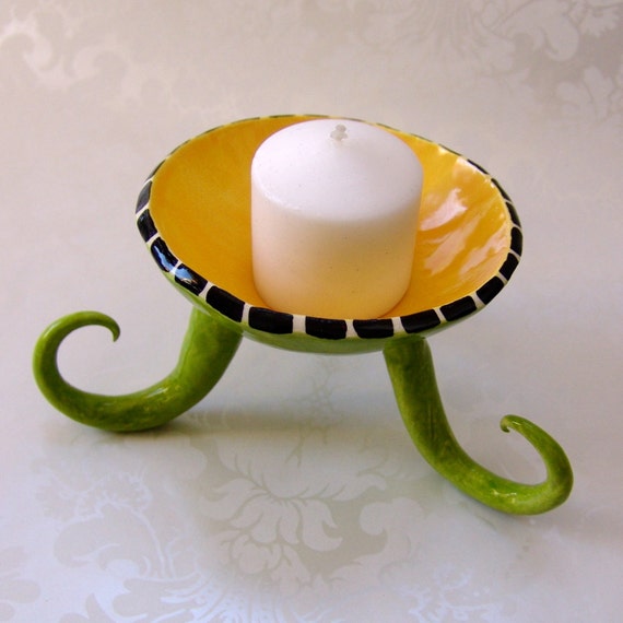 whimsical ceramic candy candle dish with curly legs