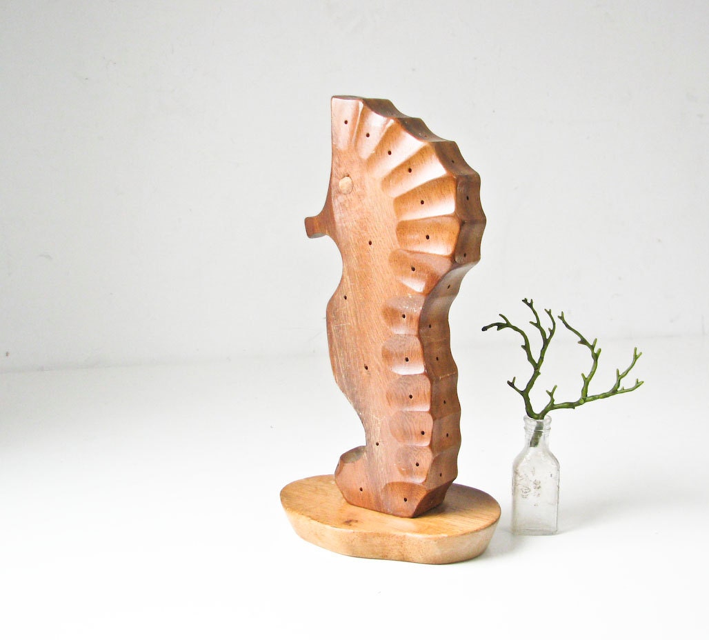 wooden seahorse statue