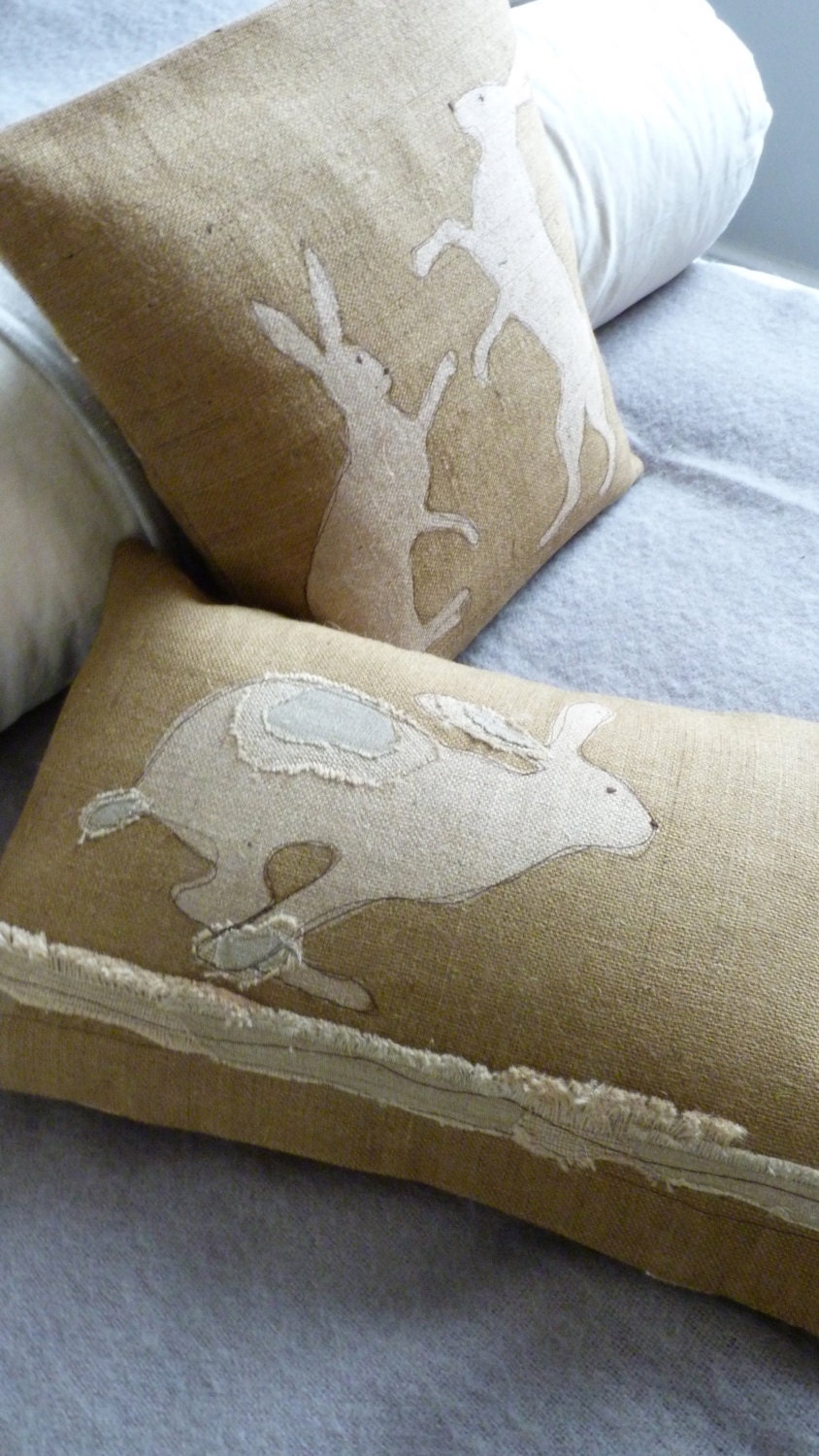 handprinted rustic hessian hare cushion cover with applique