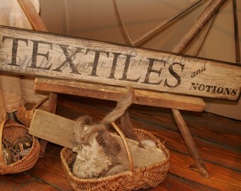 Early looking Antique Primitive 'Textiles and Notions' Wooden Sign