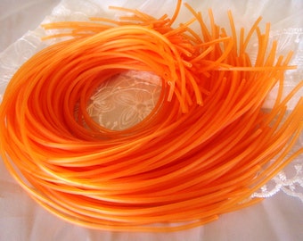 Rubber Cord tube 2mm(0,08in), hole 0,8mm(0,03in), PVC, Orange- 0,30m/ 1foot approx.(10 pieces)