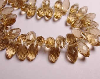 Faceted teardrop crystal briolette beads - 24 pcs - 12mm by 6mm - top sideways drill - topaz color
