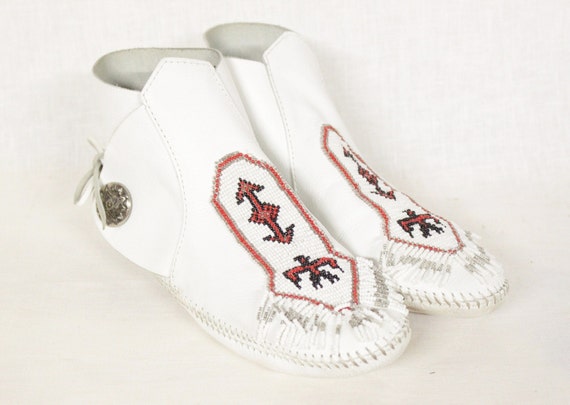 1970s White Leather Moccasin Boots By Minnetonka Thunderbird