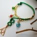 The Legend of Zelda's® Wise Ear Bend with Hanging Spiritual Stones and Triforce