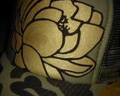 Camo trucker hat with dark brown lotus and gold fill