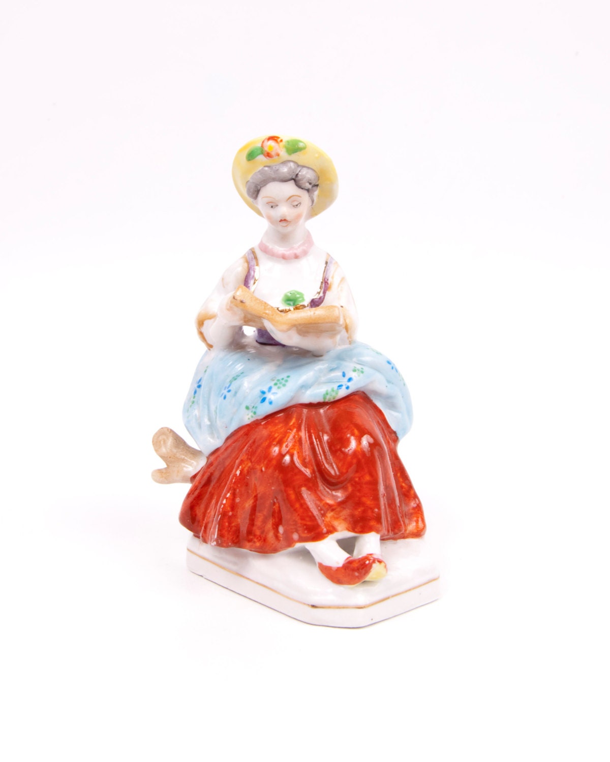 antique colonial figurines