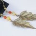 Dangling Earrings with a Gold leaf
