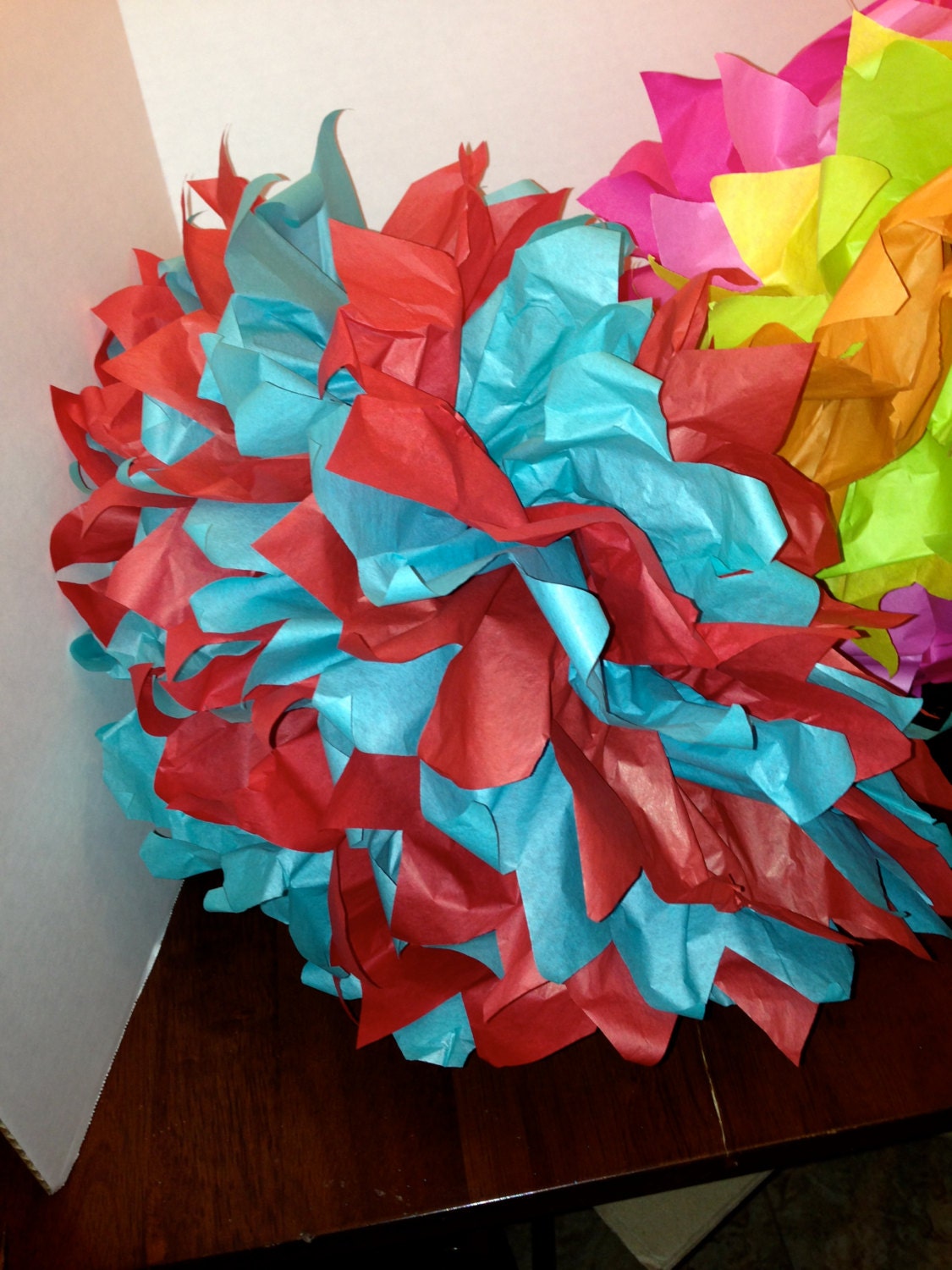 Tissue pom pom in Red and turquoise or spring arrangement