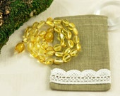 Baltic Amber Baby teething necklace lemon, polished, olive beads in Lovely Linen gift bag