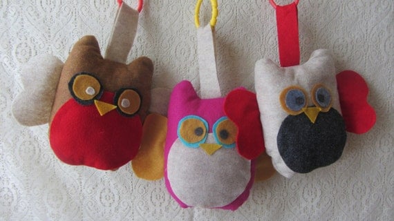 Hanging owl car seat toy.