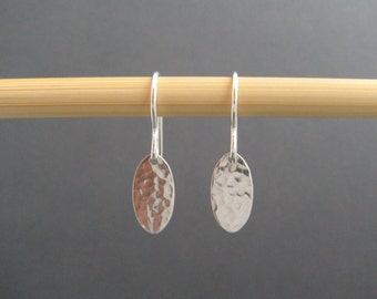 tiny silver dangle earrings. hammered silver earrings. small oval. sterling everyday earrings. drop earrings. simple jewelry.