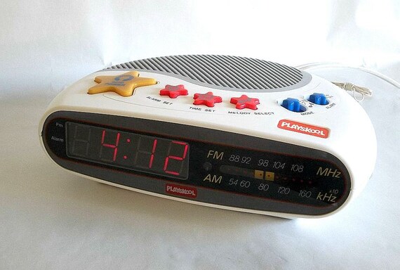 Vintage Playskool alarm clock radio with nightlight and 3