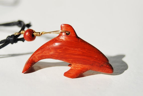 Dolphin necklace / pendant handcarved from padauk wood / exotic wood