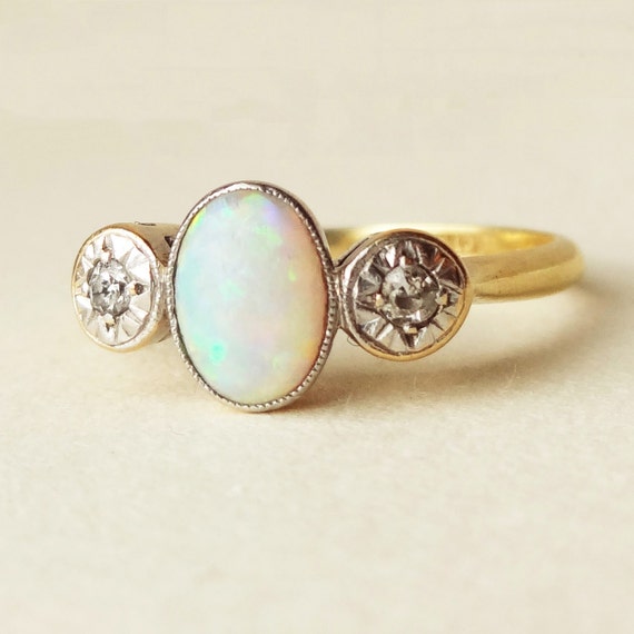 Opal diamond engagement rings