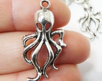 8 Octopus Charms17x31x4mm ITEM:AD16
