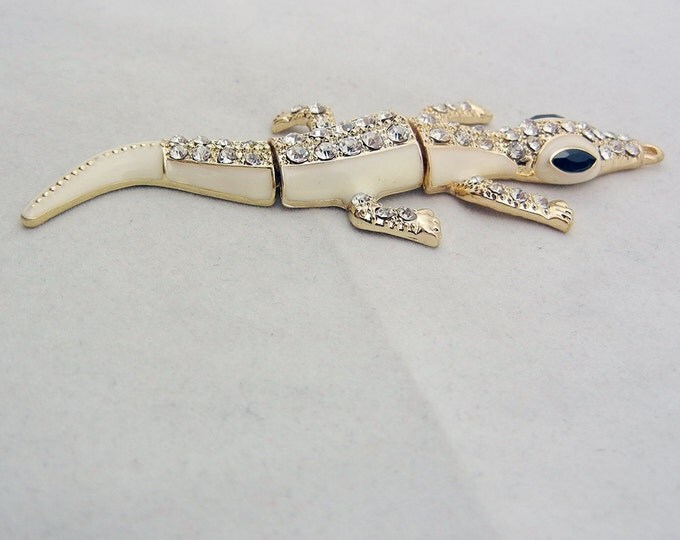 Gold-tone Flexible Alligator Pendant with Rhinestones and Creme Epoxy