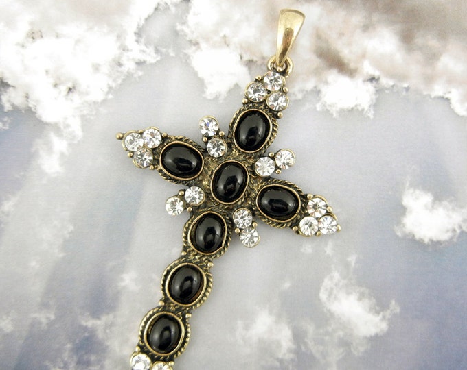 Black Acrylic Oval Cabochon Decorated Gold-tone Cross Rhinestone Accents