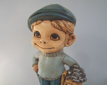miniature golfer figurine