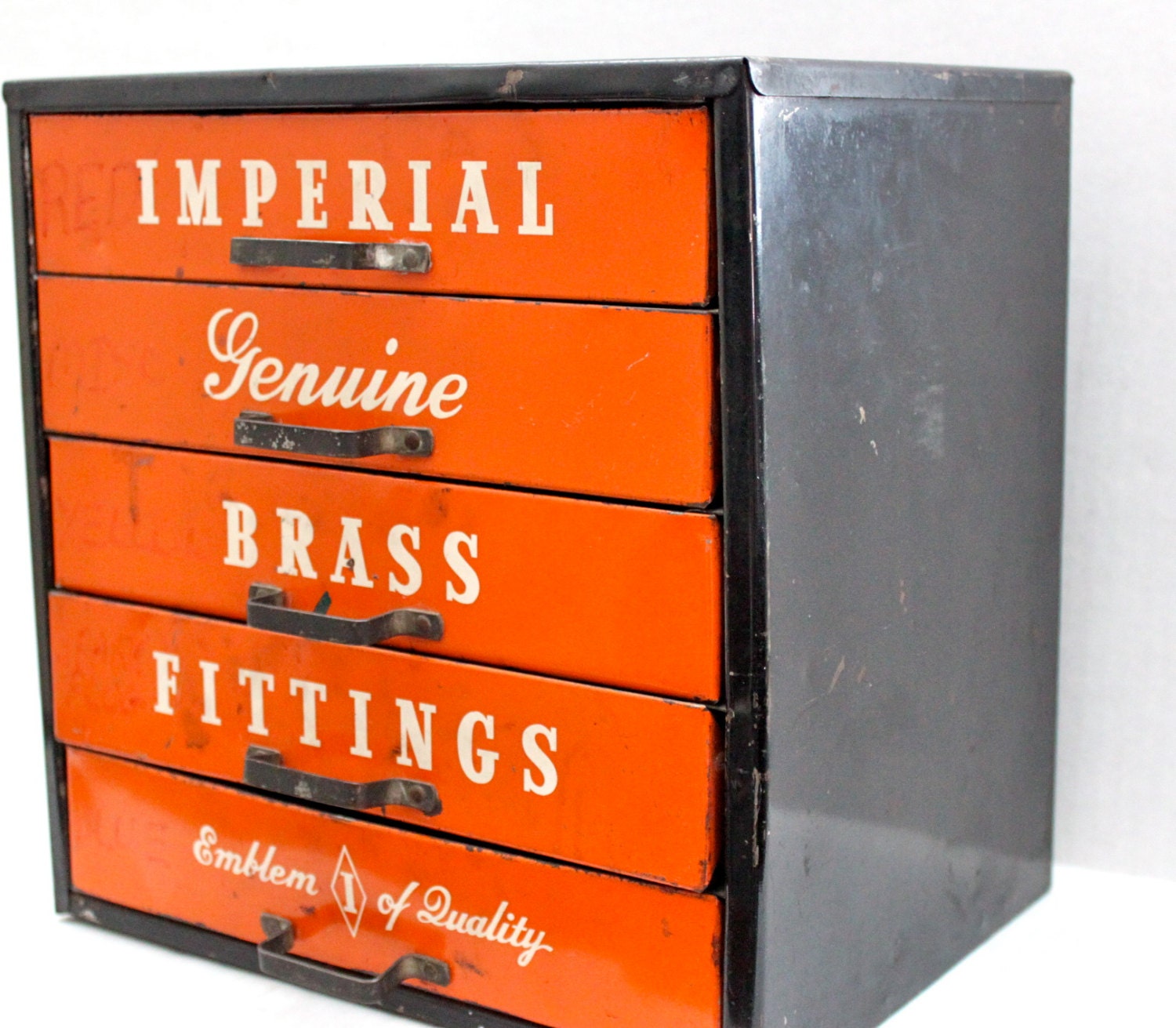 vintage Imperial Brass Fittings metal store display // orange