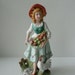 CLEARANCE - Homco Porcelain Farm Girl with Fruit and Chicken Figurine