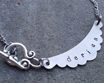 hand stamped banner NAME necklace