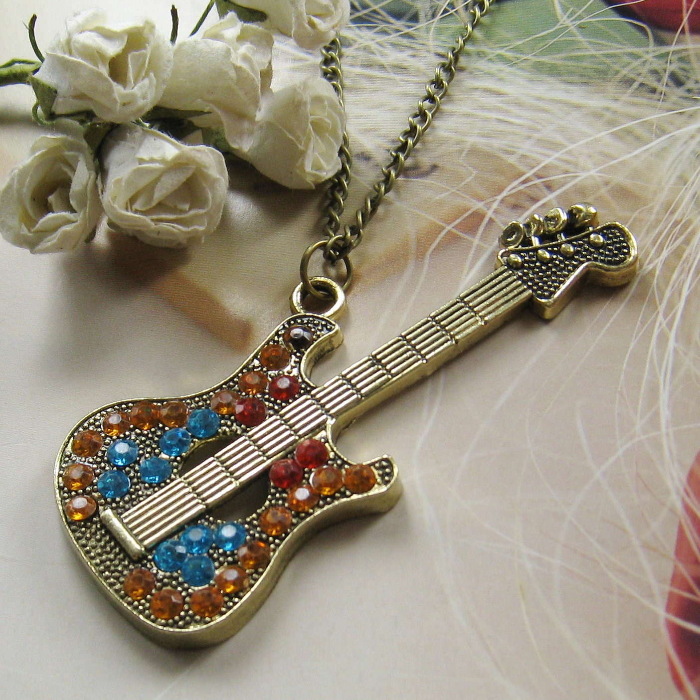Large colourful rhinestone guitar charm necklace Long by icerose11