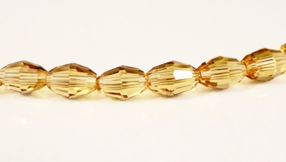 Oval Crystal Beads 6x4mm Golden Champagne Yellow Faceted Rice