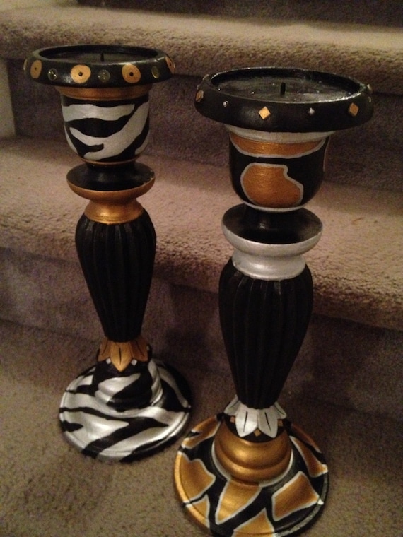 All Listings This Mikasa Nickel Leopard Glass Hurricane Candle Holder introduces a striking modern decorative accent to your home while also ad ding ambient light to your living space. The contemporary bowl shape is adorned with a metallic silver nickel finish with clear leopard print spots that .