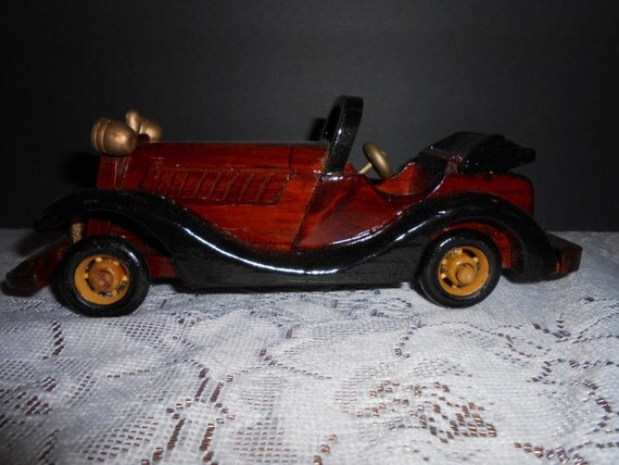 carved wooden cars