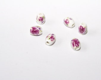 10 Pcs. porcelain beads / ceramic beads / white with pink flowers / 8x10 mm KS55