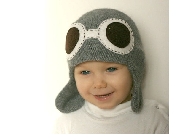 Have your little guy soaring in style, wearing this knit aviator hat ...