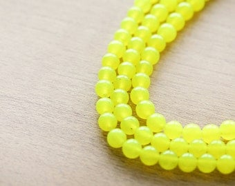40 pcs of Yellow Round Dyed stone Beads - 5 mm