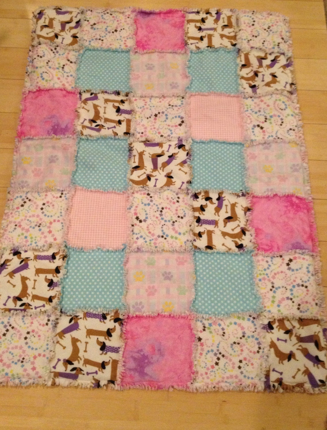 Flannel print rag type quilt with batting featuring dachshund