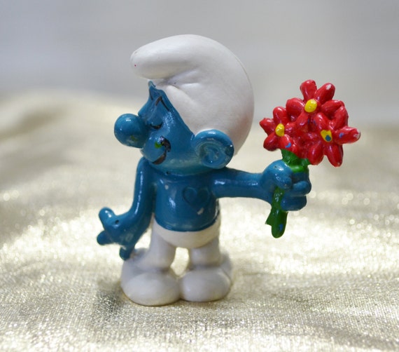 Vintage Lover Smurf Holding Flowers with Heart on Chest